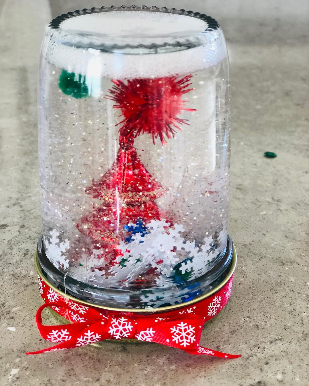 So pretty! Your kids must love it. It will be fun to play with the snow globe.