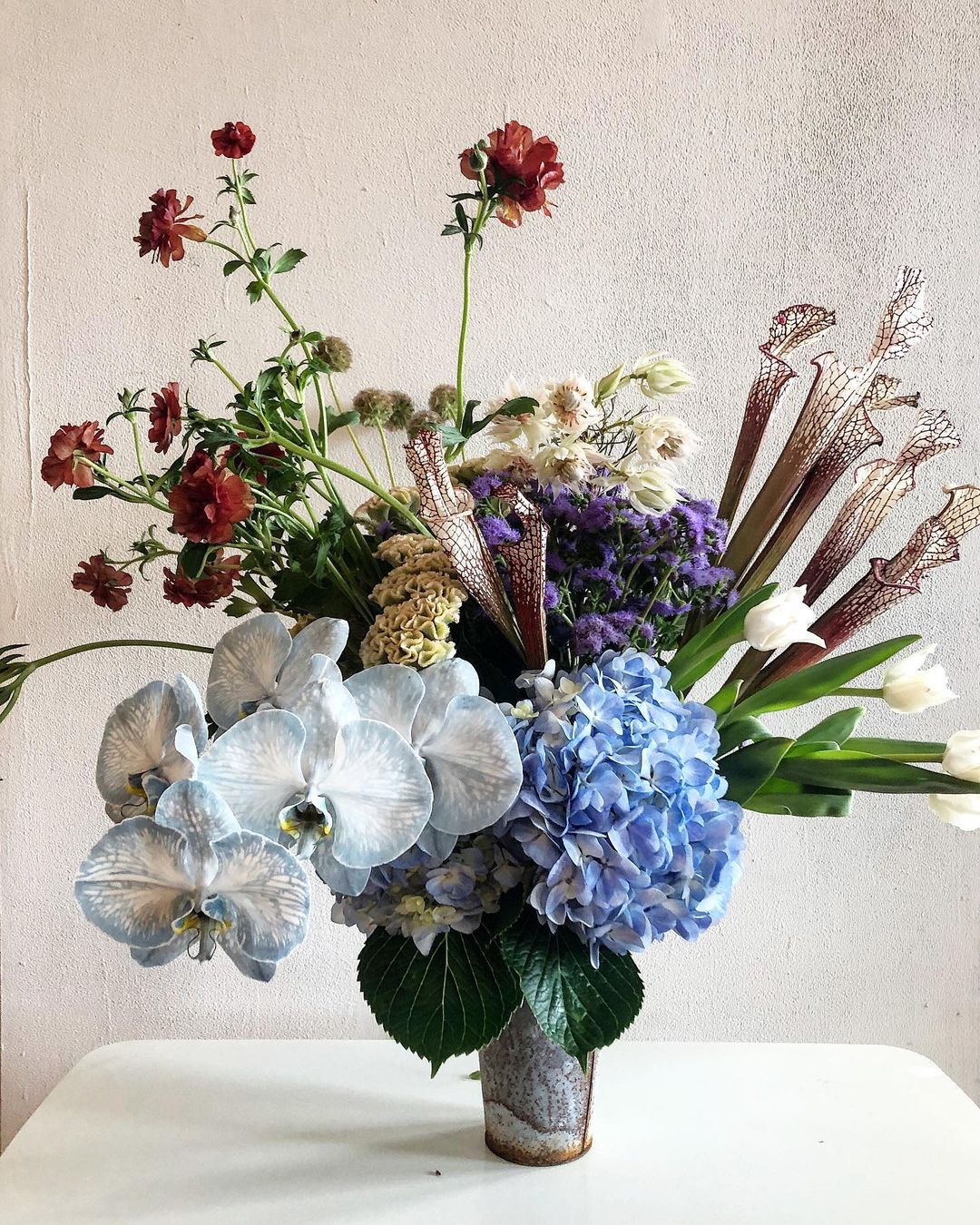 Each of the flowers arranged in this vase has its own unique characteristic.