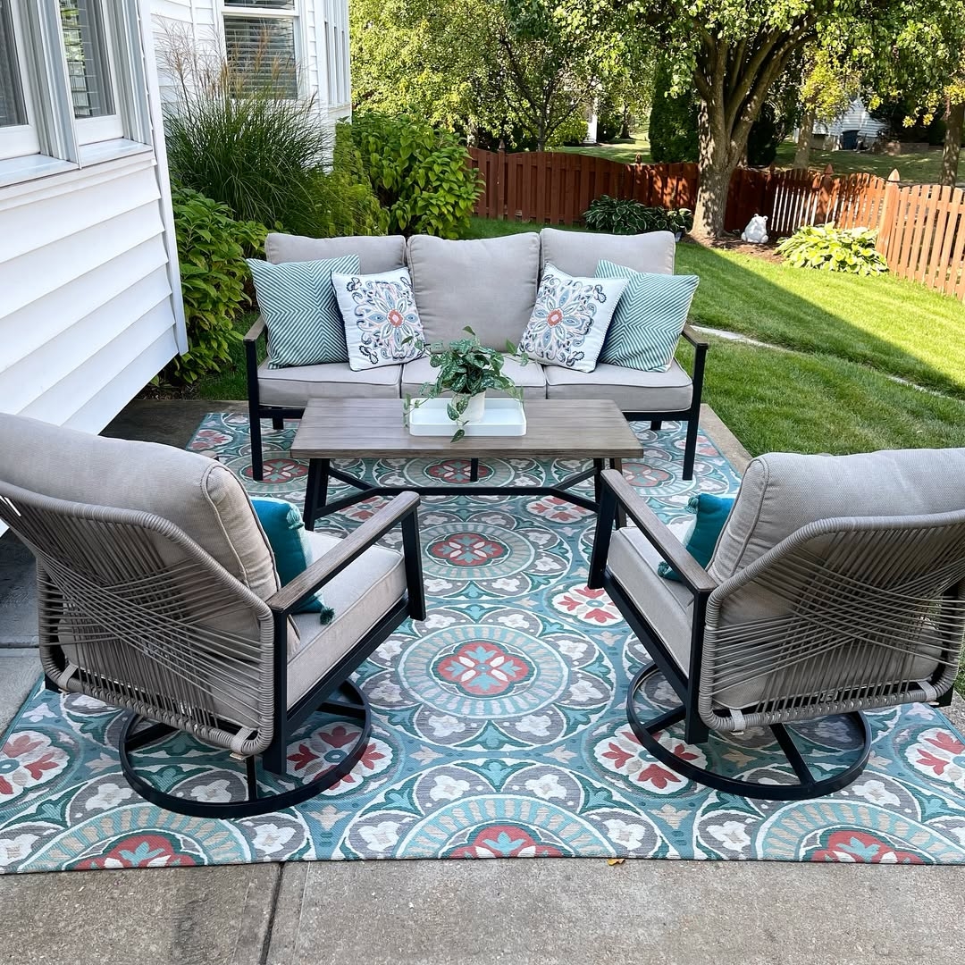Patterned rug and pillows
